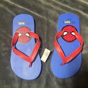 Spider-Man flip flops. NWT. Size 3/4